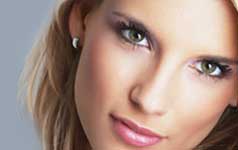 closeup of a womans face as she gazes forward